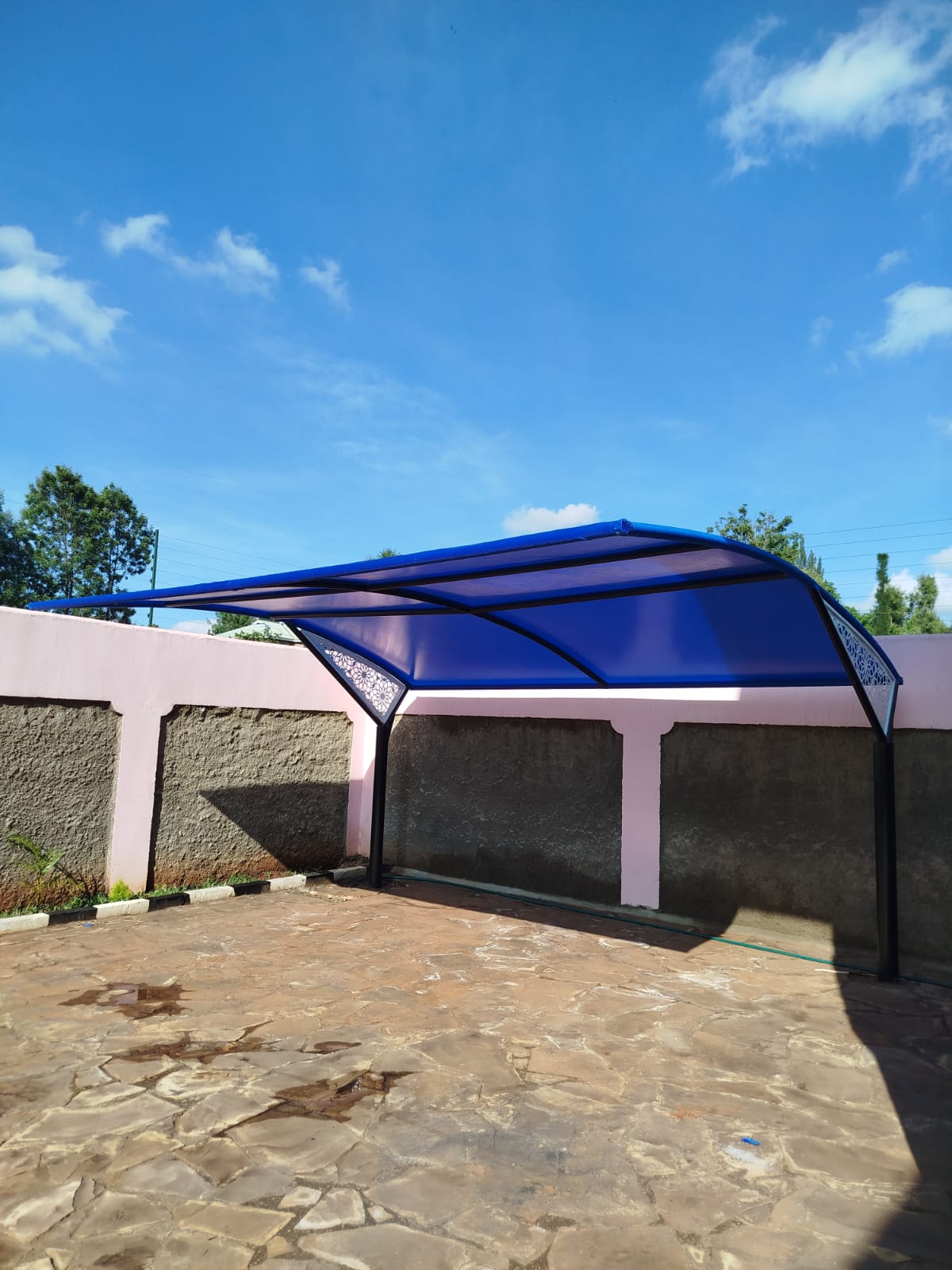 Blue decorative car parking shade, alternate view
