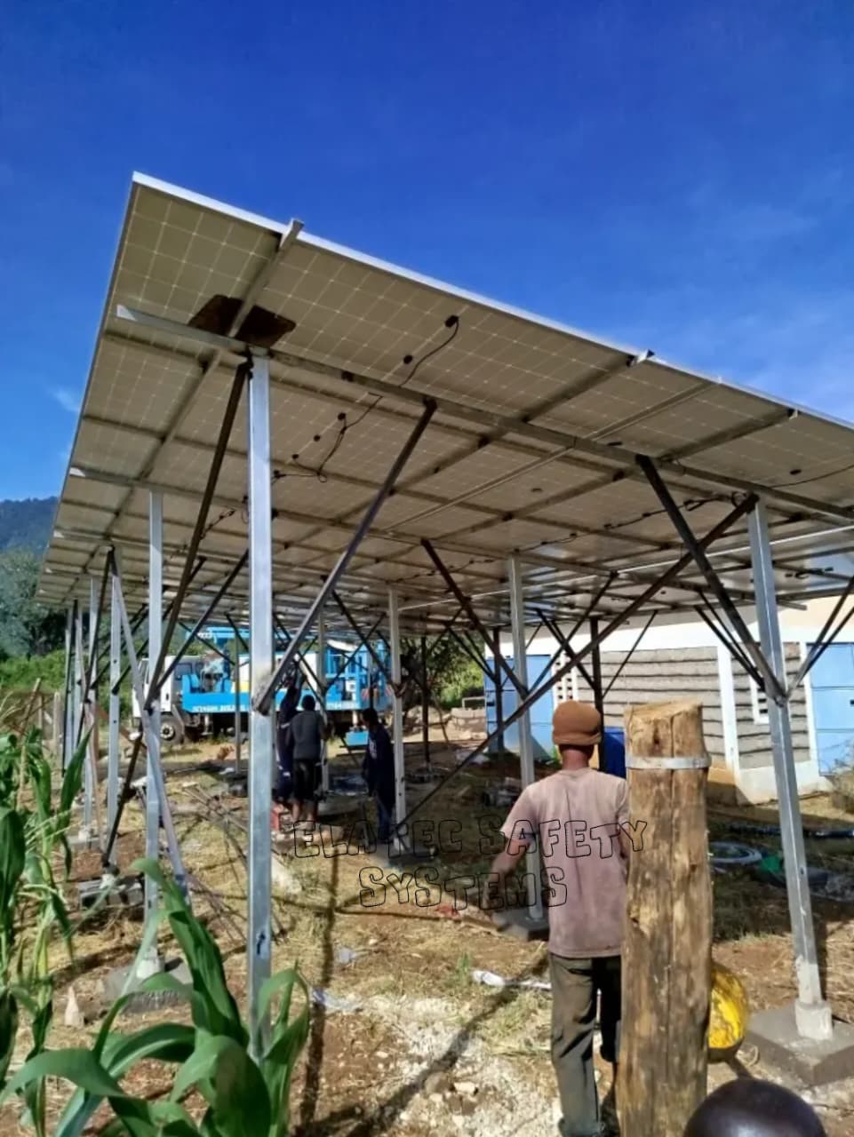 Ground-mounted solar panel array, frame and wiring progress