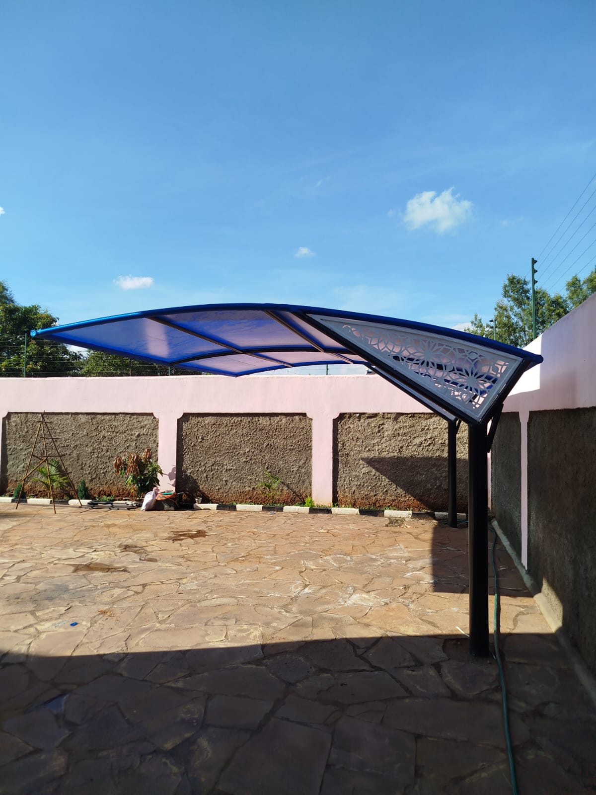 Blue decorative cantilever car parking shade structure