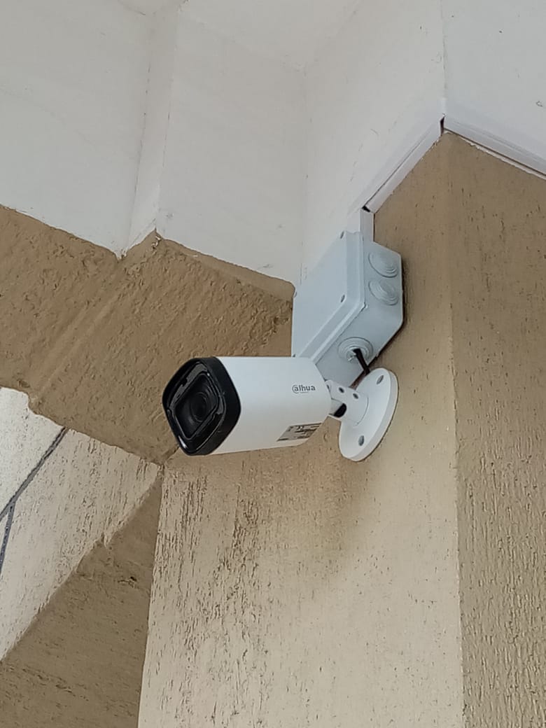 Dahua CCTV bullet camera installed and wired on an exterior wall